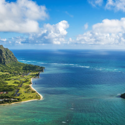 Aerial view of Kualoa Point and Chinamans Hat at Kaneohe Bay, Oahu, Hawaii, USA